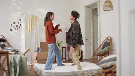 couple celebrating moving into new home