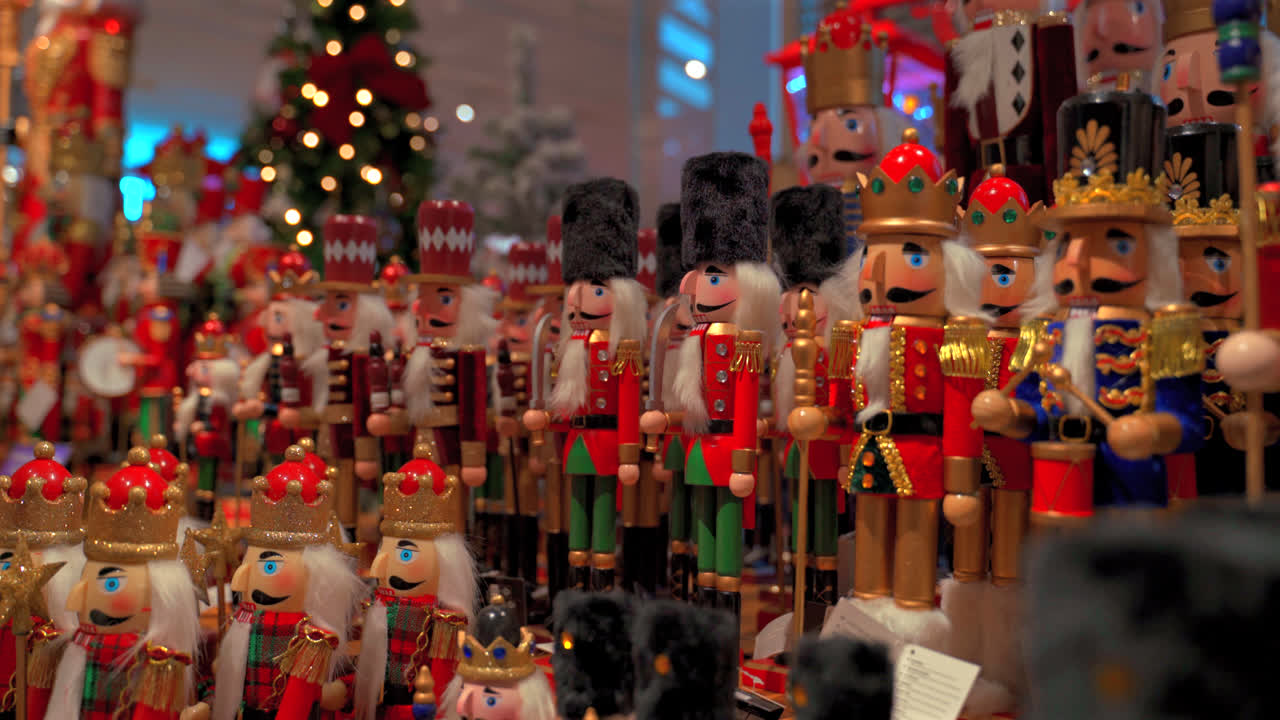 Rows of toy soldiers and christmas decorations with glowing lights in festive holiday display