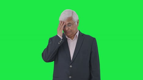 Stressed-and-tensed-Indian-senior-manager-Green-screen