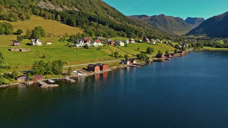 aerial over syvde waterfront on a lovely sunny day, vanylven municipality, norway