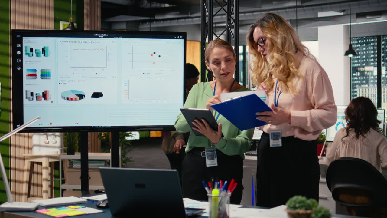 Vertical Video Goals oriented businesswomen representing strategic collaboration