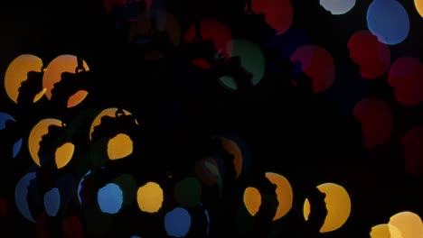 luces abstractas bokeh en fondo negro. forma