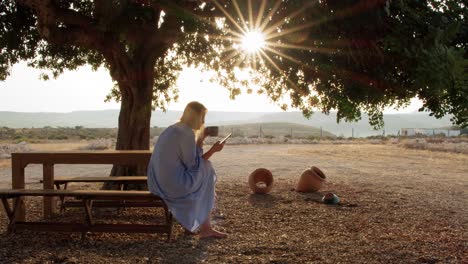 Countryside-scene-with-relaxed-woman-and-bright-sunshine