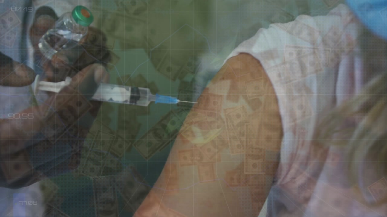Animation of graphs and dollar bills over diverse male doctor injecting syringe to female patient