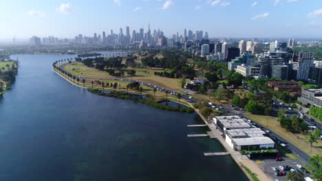 drone over albert park, melbourne city in background