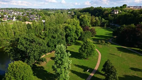 The Ondine Park aka Le Parc des Ondines in a pretty wooded park side from above, Changé, Mayenne, France