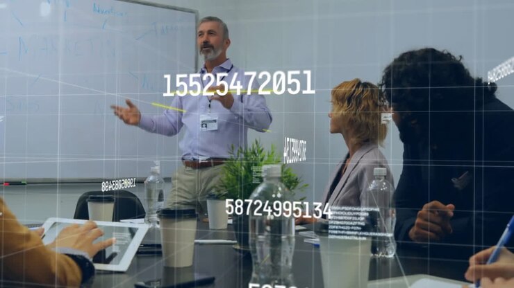 Animation of financial data processing over diverse business people in office