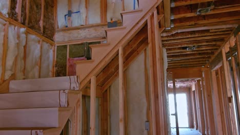 wooden frame walls with insulated with rock wool fiberglass insulation for cold barrier