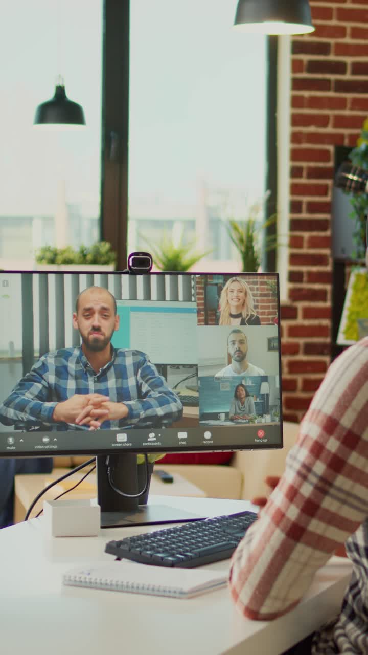 Vertical video: African american man attending online class meeting