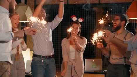 office christmas party with sparklers