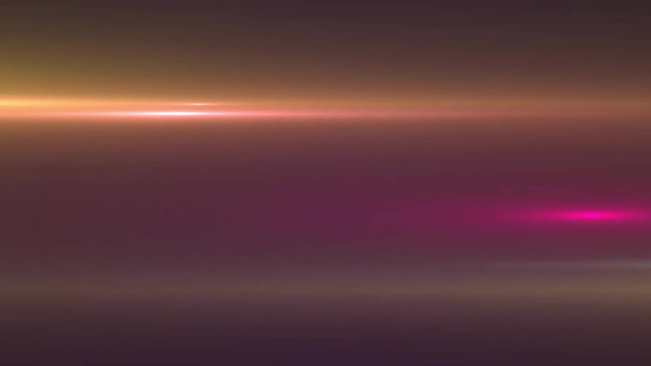 animación de rastros de luz coloridos sobre un fondo negro