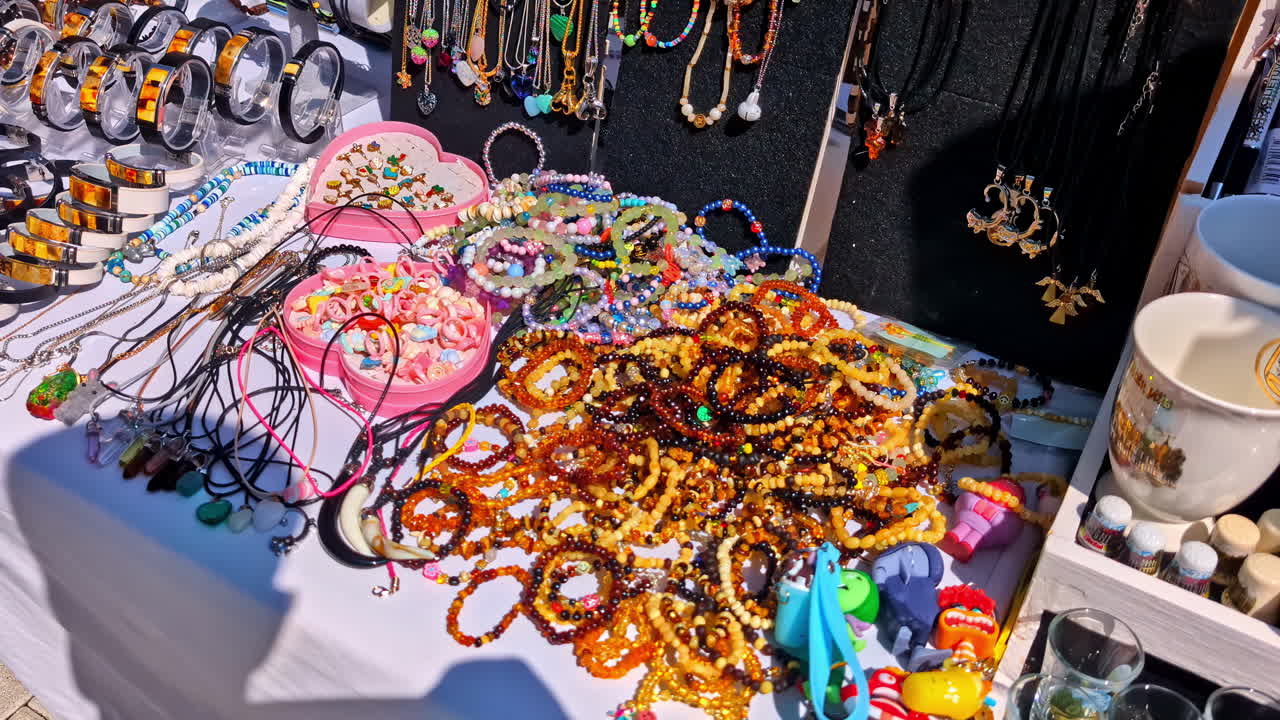 Collection Of Handmade Jewelry And Fancy Accessories For Sale In A Market. - closeup shot
