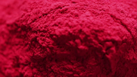 Video-of-close-up-of-red-powder-with-copy-space