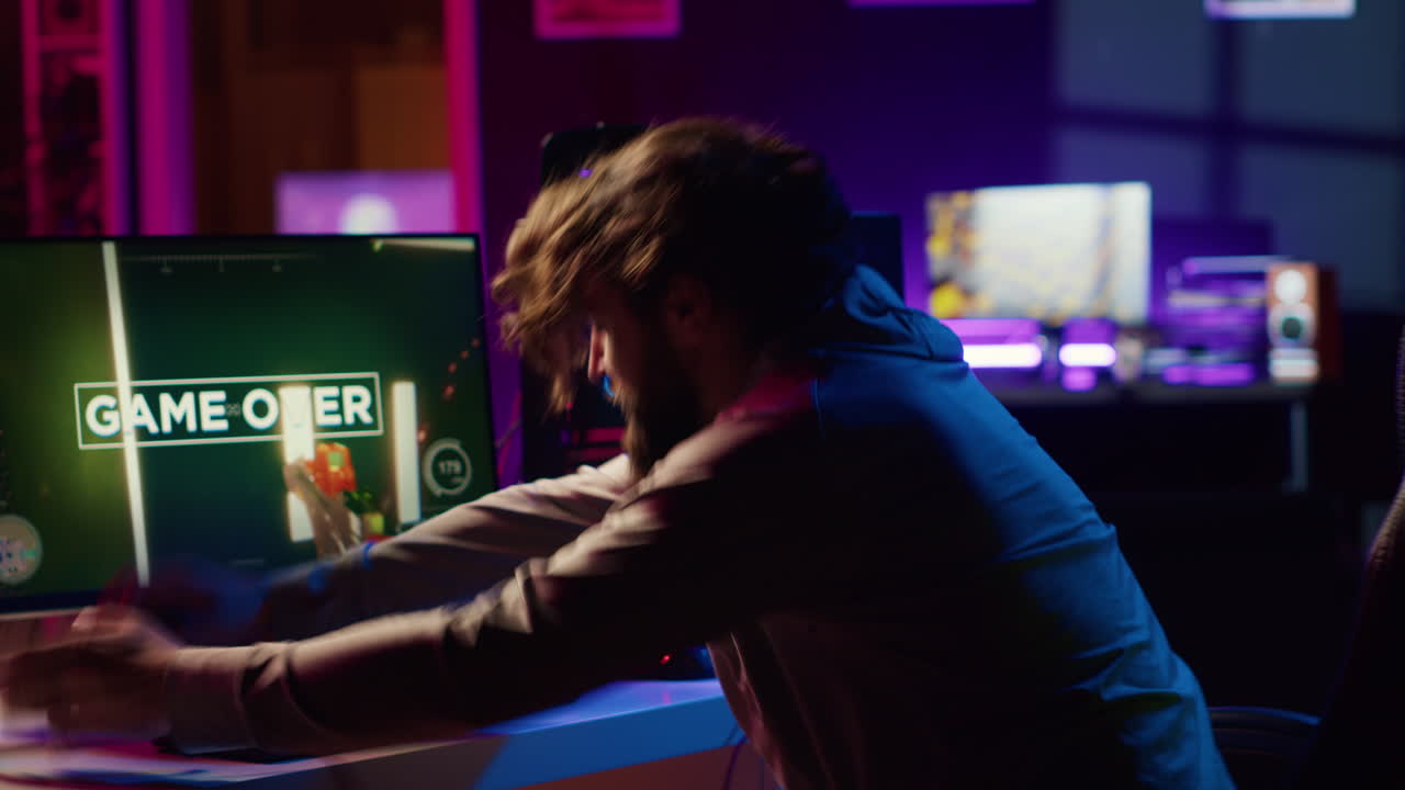 Player upset after being defeated in videogame, losing all health, failing to win level