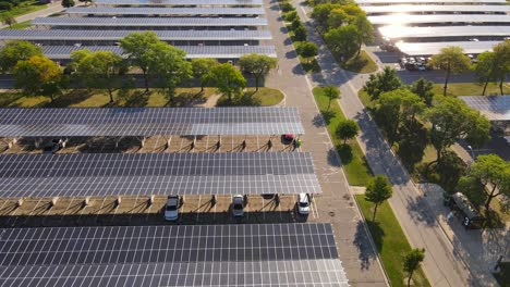 solar panels making shadow on parking lot in lansing, michigan, usa, aerial view