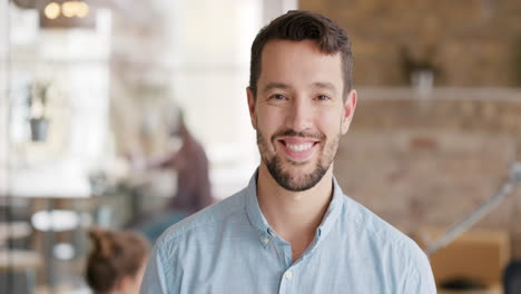 Portrait-of-successful-Businessman-entrepreneur-at-busy-office