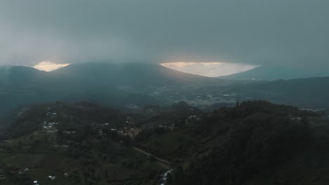 drone aerial view, high over the mountains during cloudy cold weather in guatemala