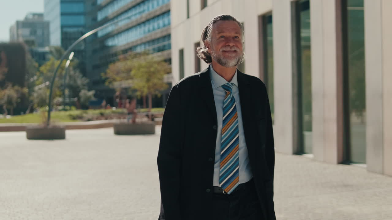 Happy Senior Businessman Walking in the City