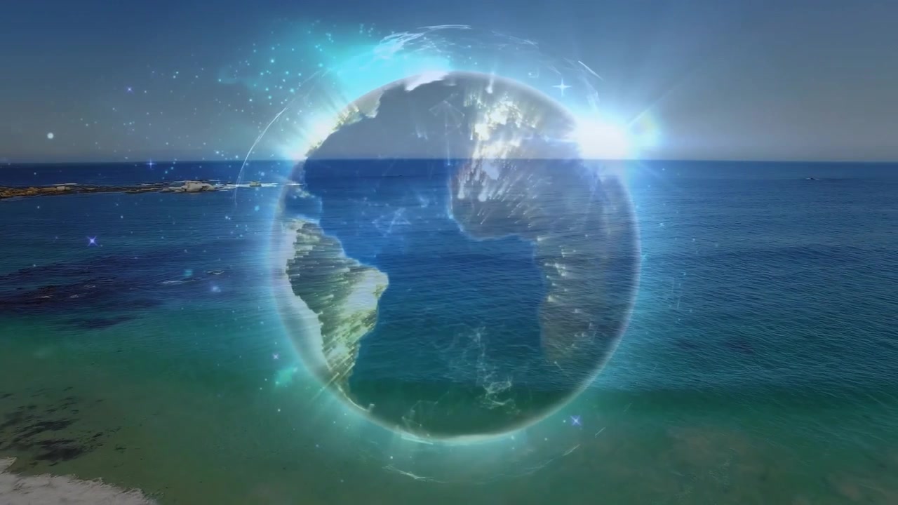 Globo que se esvai girando continentes brilhantes e faíscas, então escurecendo e revelando uma praia calma.