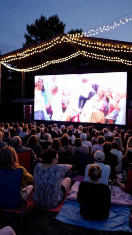 outdoor movie night experience with an audience