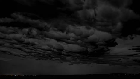 nighttime stormy cloudscape over city