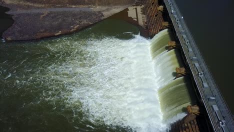 Low-aerial-sideways-fly-over-the-Goulburn-Weir,-Victoria,-Australia