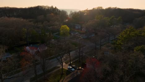 Pushing-forward-over-a-small-sandy-beach-town-at-dusk