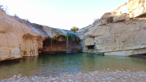 a waterfall in the middle of the sahara desert algeria biskra