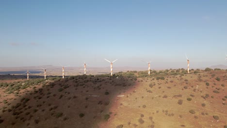 stopped,-broken,-not-spinning-wind-turbines-on-a-mountain-landscape-in-Israel,-Golan-Heights