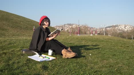 woman laying on grass