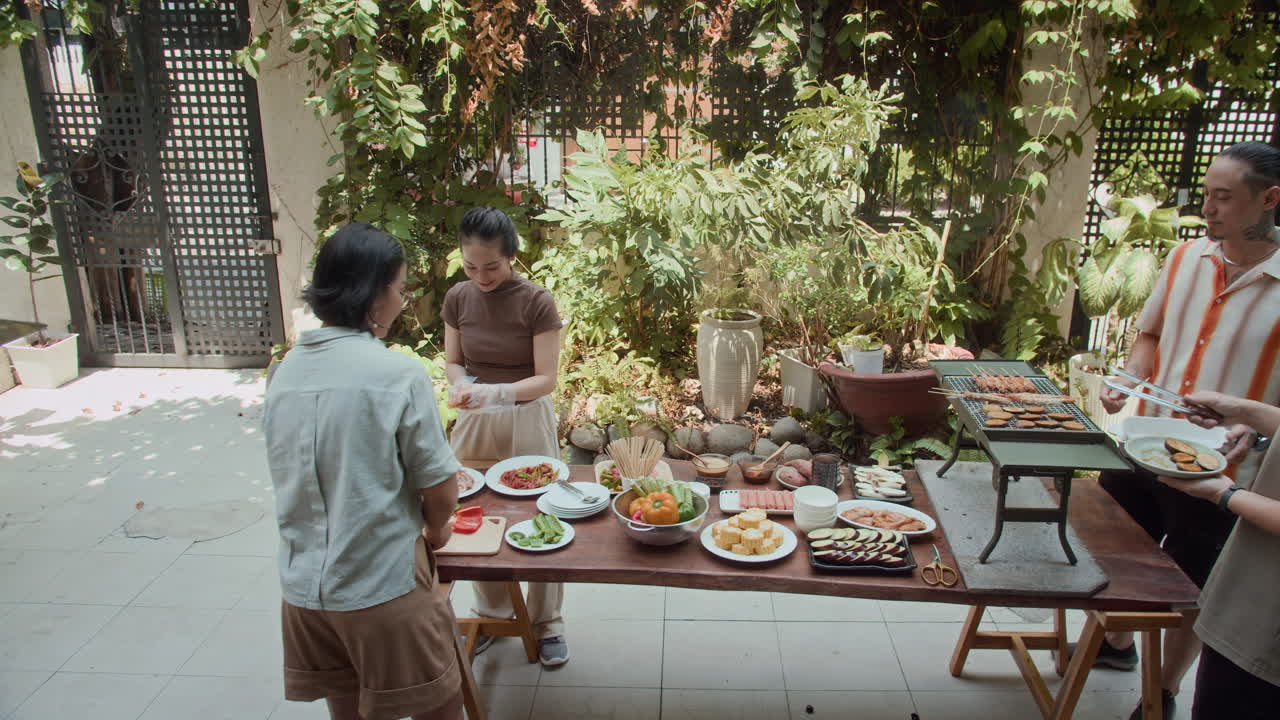 Multi-ethnic Friends Having Barbecue Party at Weekend