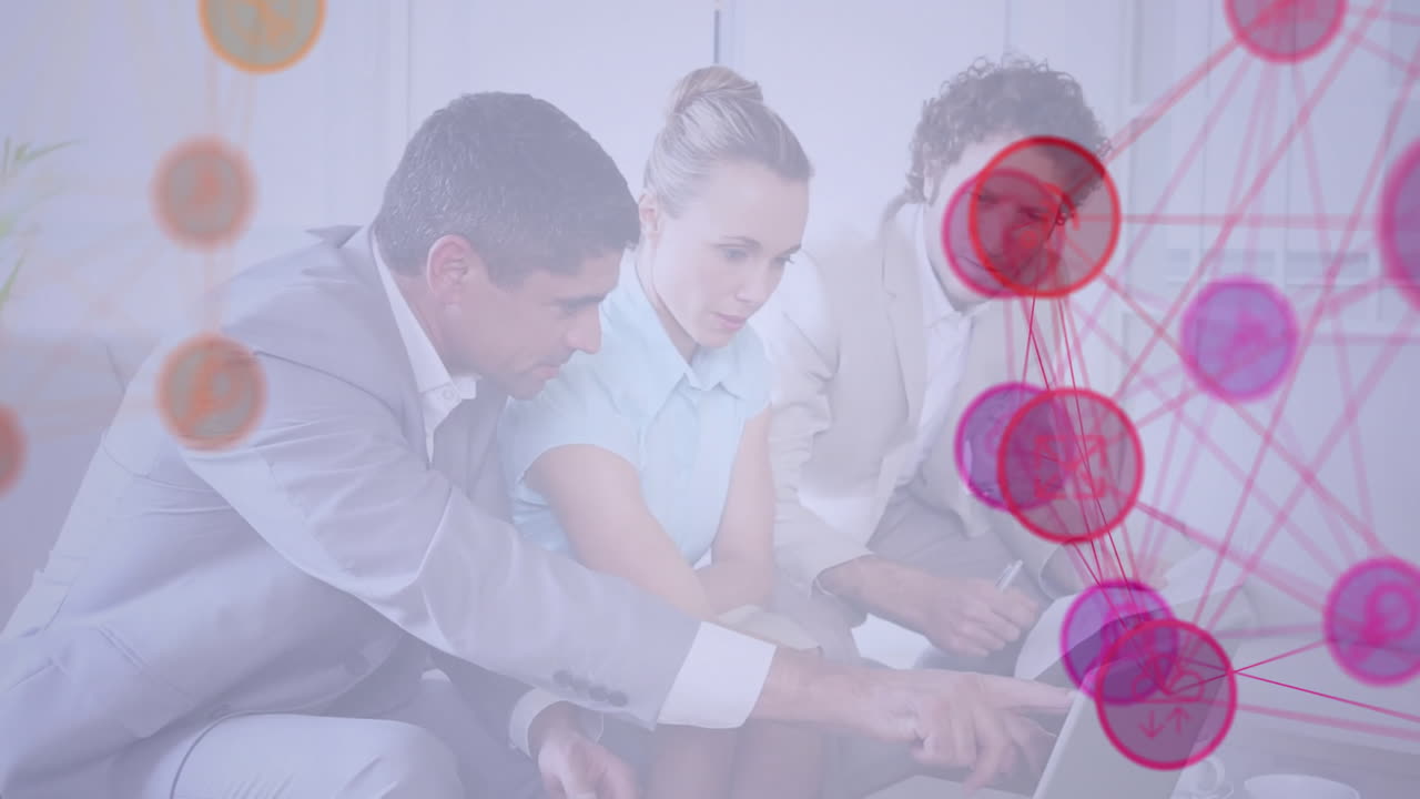 Collaborating over digital network, business professionals discussing project in office