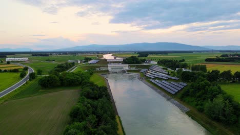 captivating aerial 4k drone footage of a solar panel plant nestled alongside the drava river in slovenia