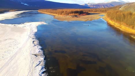 ice drift on the yakut river in spring from a drone