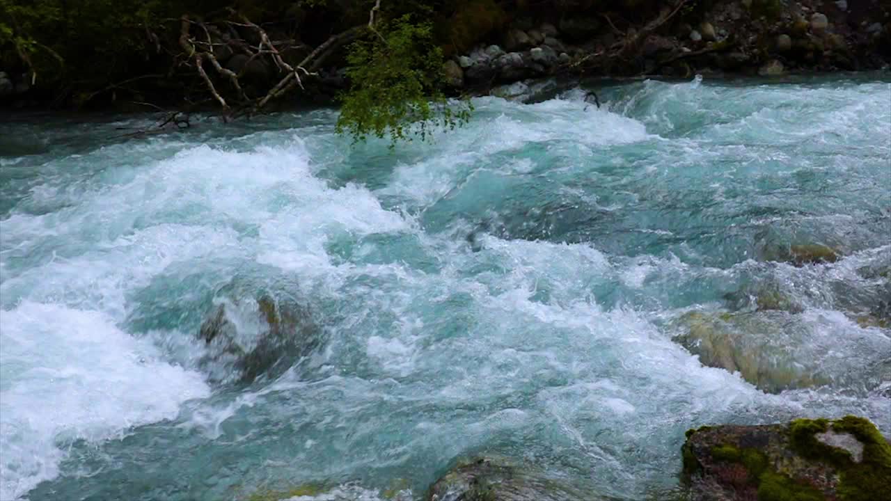 Mountain river water with slow motion closeup