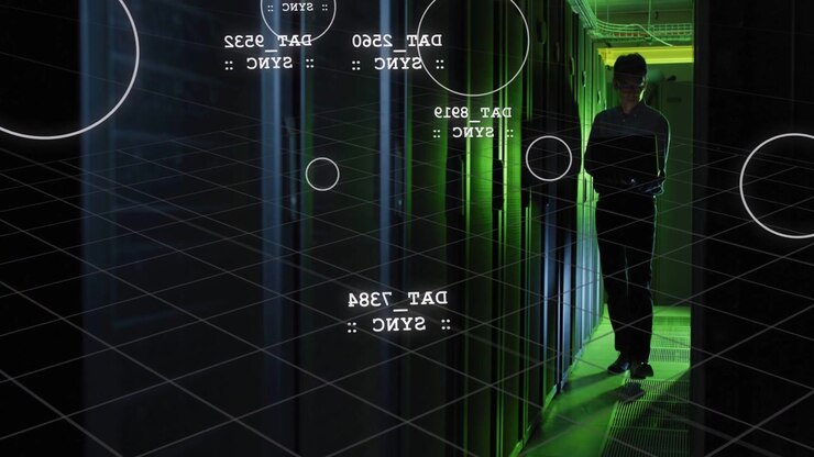 Green light revealing tech walking rack aisle, pausing, holding tablet, HUD syncing for monitoring
