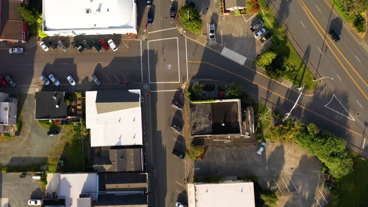 Cars And Traffic On The Streets In Old Town Bandon, Oregon - aerial drone, top-down