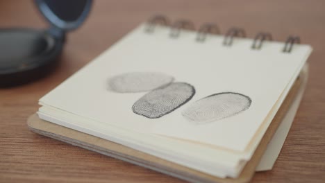 fingerprints on a notebook