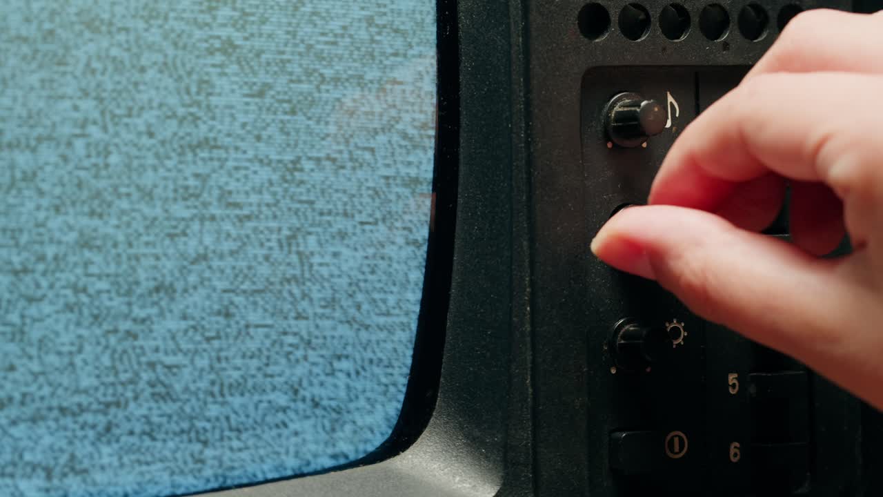 Retro Style TV Set with Green Screen chroma key background, vintage 60s analog television with grain and noise.