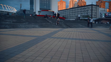 people moving city background in downtown urban area at evening.