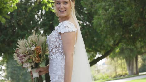 bride sways dress beautifully in the sun