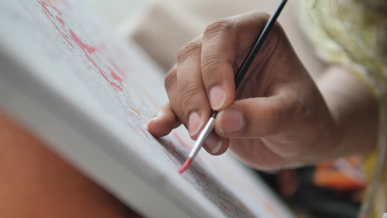 Person Painting with a Brush