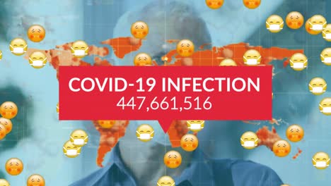 Animation-of-covid-19-data-processing-over-man-and-multiple-sick-emojis-with-face-masks