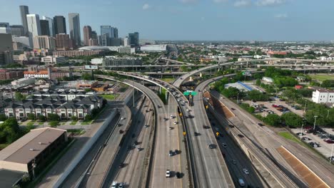 downtown houston interstate traffic. aerial drone view