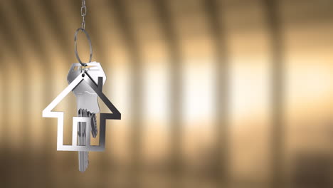 house-shaped keychain animation over blurred background with warm tones