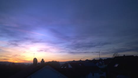 purple and blue early morning dramatic sunrise in germany in 4k