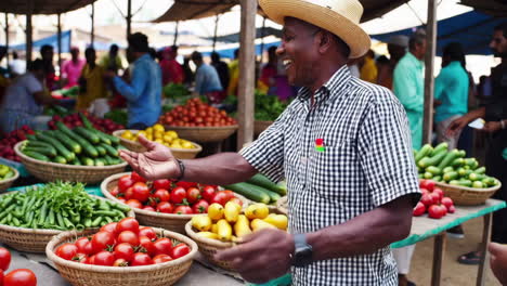 smiling vendor interacting with customer at a vibrant outdoor produce market