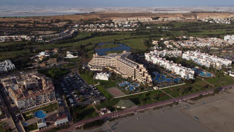 aerial flying towards almerimar hotel, el ejido, spain