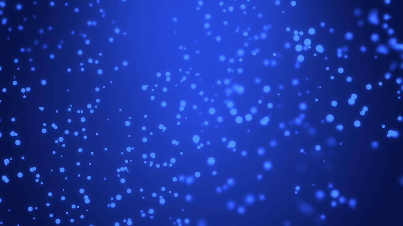Un'animazione di una luce blu tenue si espande e particelle luminose fluttuano e brillano mentre si muovono attraverso l'area di lavoro, creando una scena nevosa calma e onirica che risulta fluida, ariosa e coinvolgente