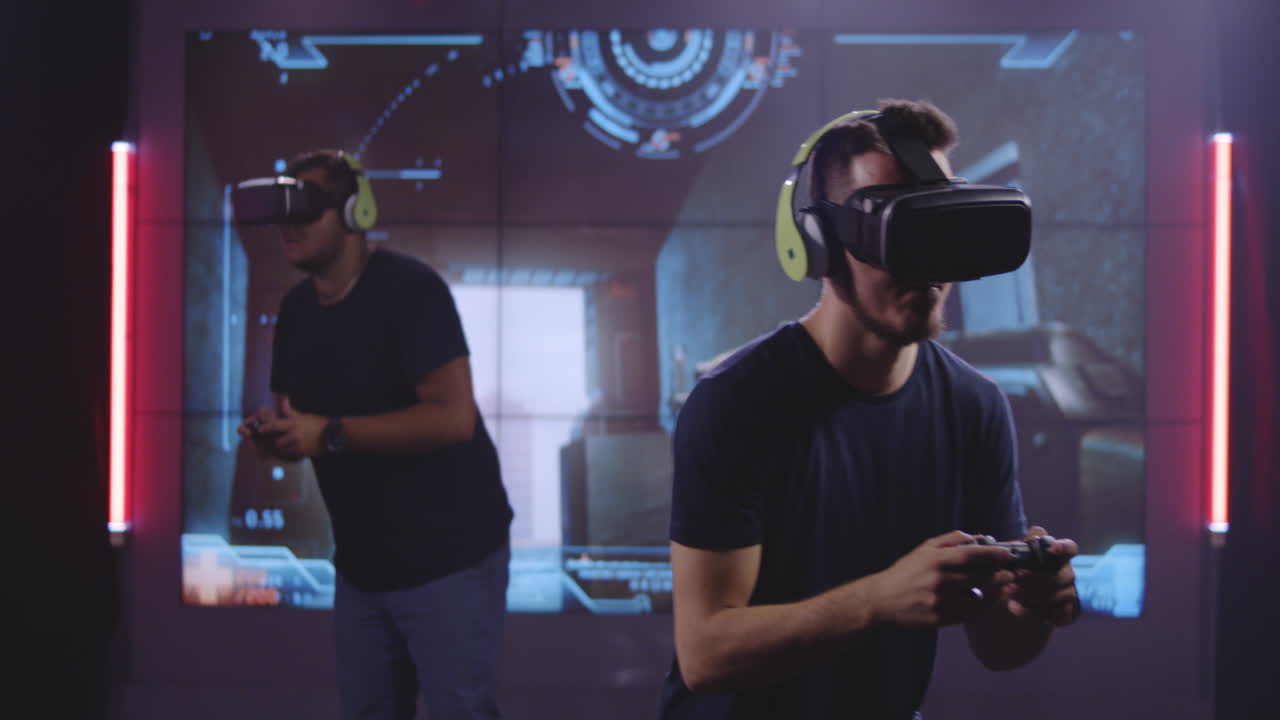 Two People Playing a VR Shooting Game